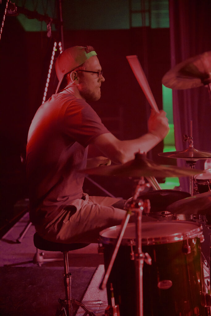 Cody playing the drums